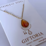 Oranje epoxy druppel hanger gouden stainless steel ketting